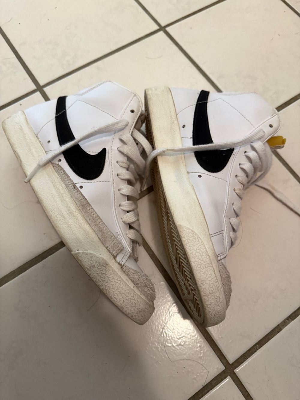 Nike White High-Top Sneakers with Black Swoosh Accent